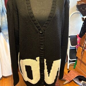 Black Button-Up Sweater, worn once.LOVE in block letters.